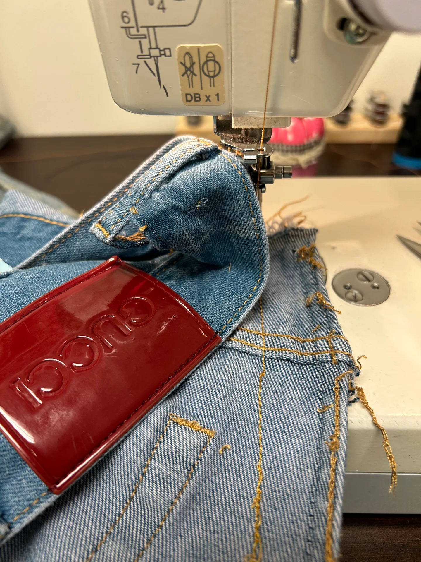 Designer denim waistband alteration on the sewing machine
